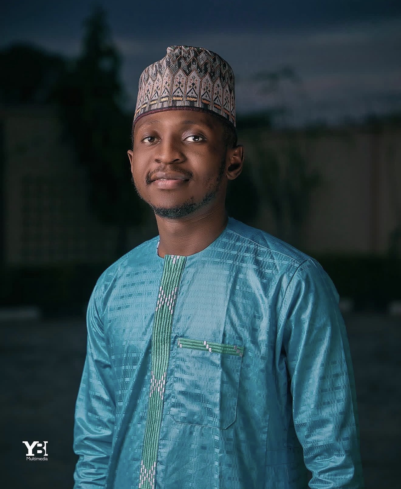 Professional portrait of Sir YB